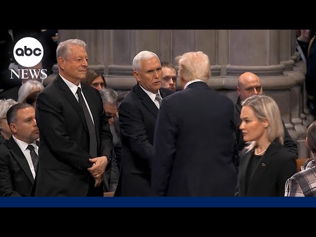 Trump shakes hands with Mike Pence at Jimmy Carter funeral