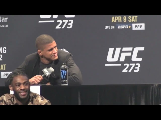 Khamzat Chimaev gets mad and slams table after Gilbert Burns makes fun of the way he talks  #UFC273