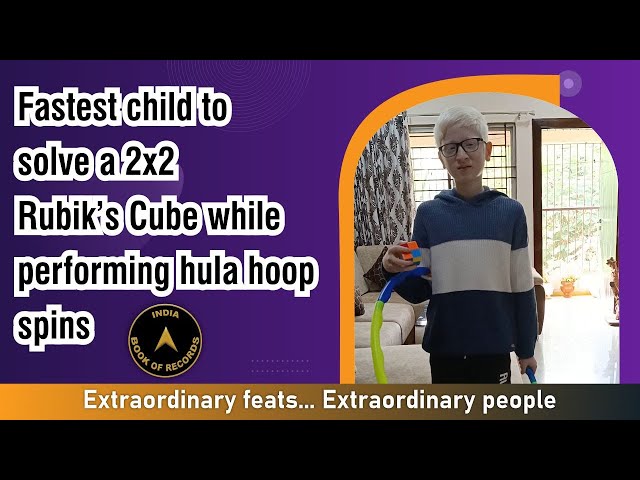 Fastest child to solve a 2x2 Rubik’s Cube while performing hula hoop spins