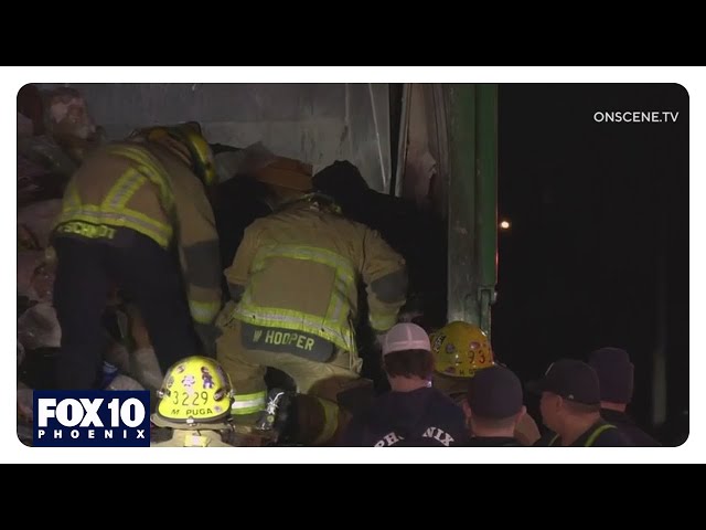 Woman found stuck inside garbage truck