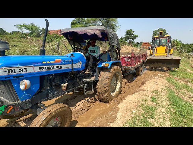 JCB 3DX Eco XPERT Loading Mud Sonalika Di-35 Tractor With Trolley & Pulling out of the Mud|Jcb video