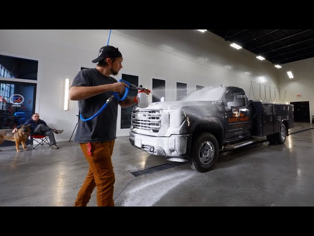 Old Glory Touch Free Wash White Glove Test on Black Pickup Truck