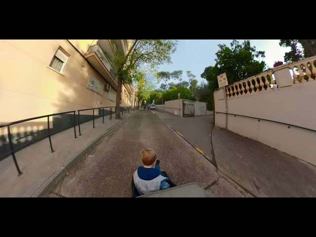 Father & son explore local towns of Barcelona. 360 travel adventures in Sant Boi.