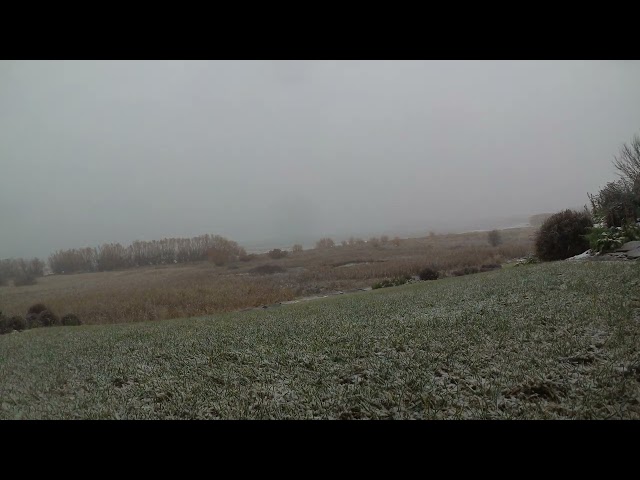 Watch Timelapse of snow falling looking towards Flathead Lake, Polson, Montana.