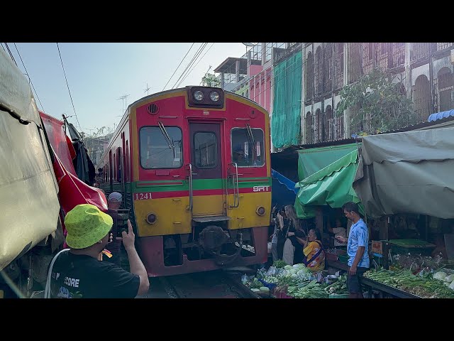 Maeklong Rom Hub Railway Market train arrival 16 Nov 2024