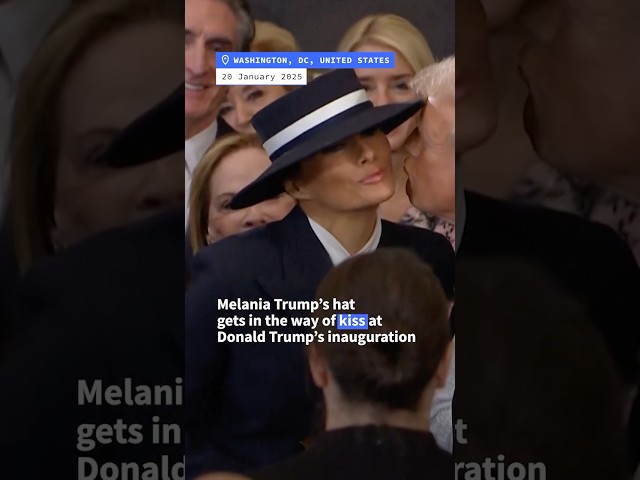 Melania's hat gets in the way of Donald Trump's kiss | AFP #shorts