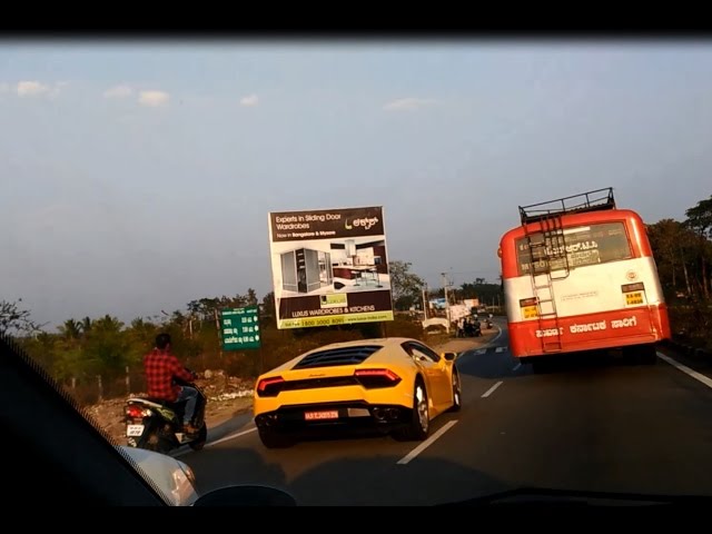 Lamborghini about to hit  biker in Mysore  - Coorg road