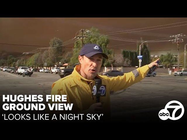 Reporter shows ground view of Hughes Fire: 'Looks like a night sky'