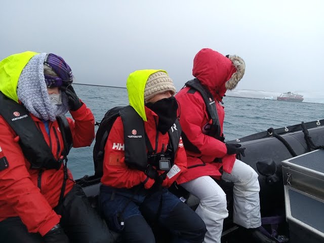 Zodiac ride across Yankee Bay, South Shetland Islands, Antarctica.