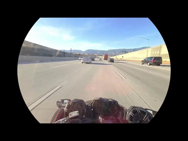 Can am spyder f3s blasting through traffic in Mexico