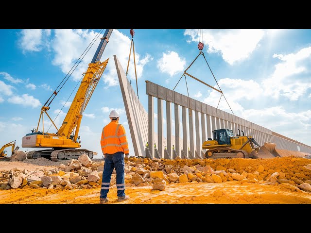 Engineers Use HEAVY MACHINERY to Construct Border Barriers