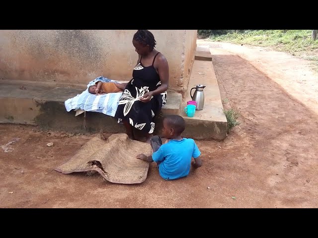 African village life of an African mom with her children