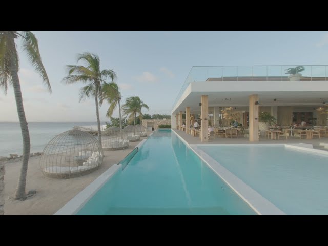 Immersive 8K 3D VR180 Tour: Glass-Walled Pool at Bonaire’s Top Dive Resort