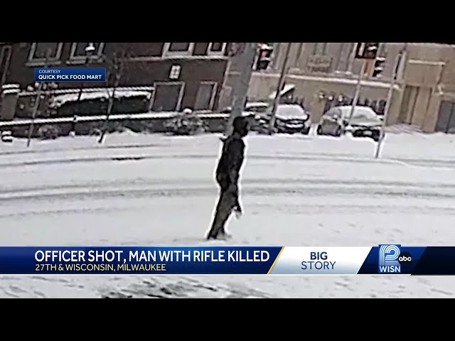 Officer shot, man with rifle killed