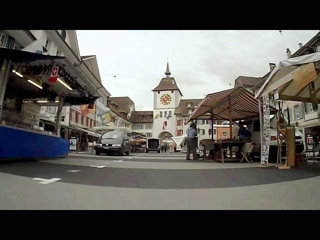 Riding through the market in Willisau, Switzerland