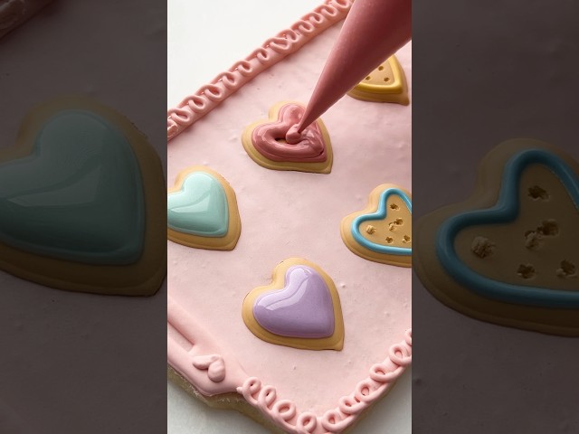 🩷🩵💛 #cookiedecorating #royalicingcookies #valentinescookies #valentinesbaking #cookieasmr