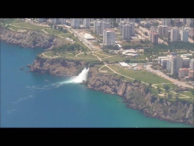 Boeing 737-800 taking off from Antalya Airport with view on the Düden Waterfalls