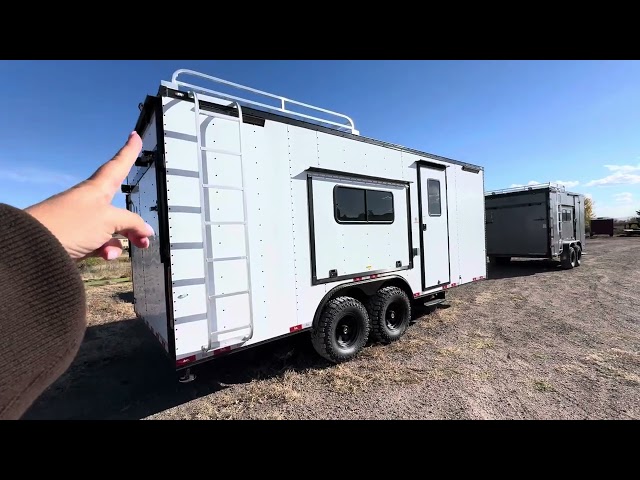 2025 8.5x20 Colorado Off Road Trailer with mounted spare, RV door, and much more!