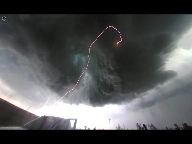 RARE 360: close-range lightning bolt ejects from wall cloud directly overhead!