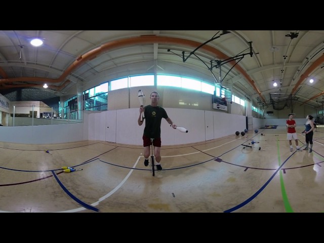 Mark and Will Passing Indian Clubs on Unicycles 3D VR