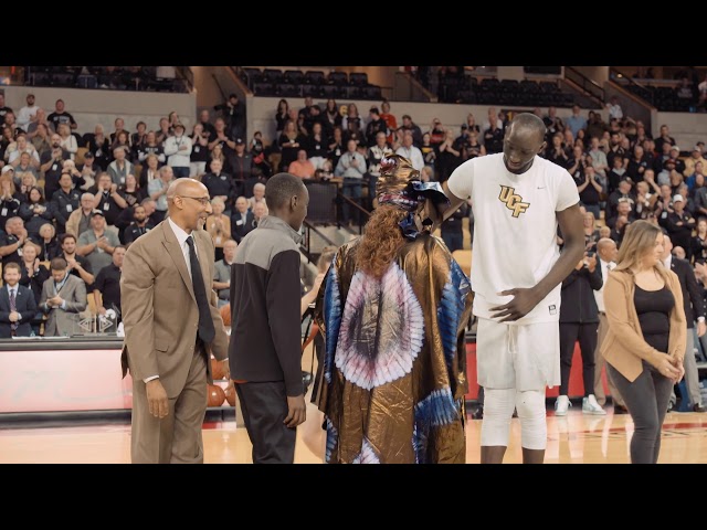 Tacko Fall walks on Senior Knight with mother who he hadn't seen in seven years