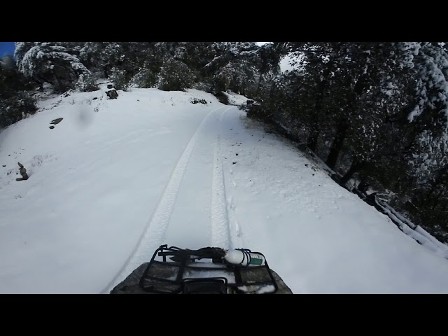 360 | Riding ATV up Snow covered Mountain during Blizzard