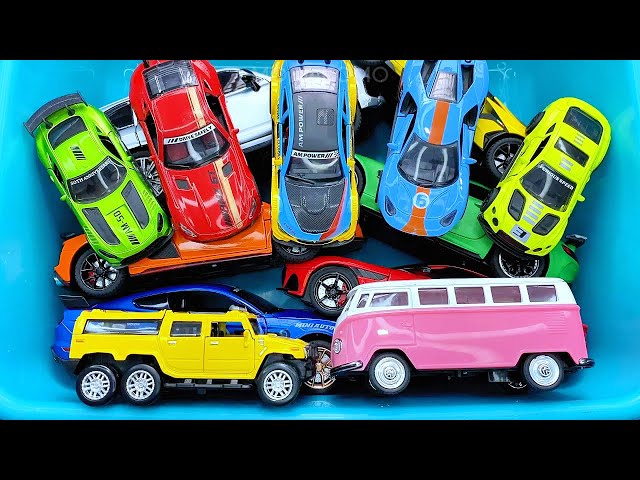 Box full of various miniature cars Jaguar, Peugeot, Renault, Hyundai, Mazda, Volvo, Honda, Opel