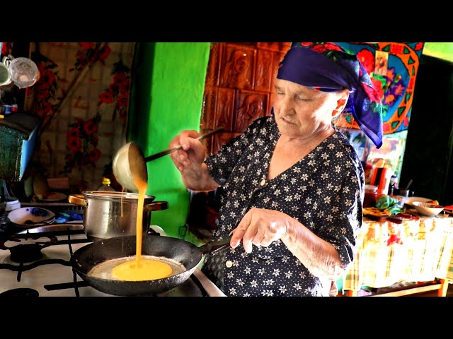 How does a Romanian grandma make chorba and clătite for her grandchildren?