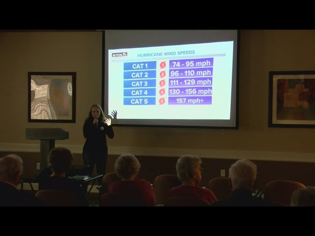 Kaylee Bowers talks about meteorology with residents at assisted living facility