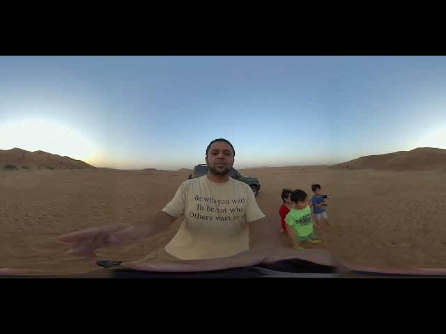 360 VR Video Climbing a Tall Dune in Desert