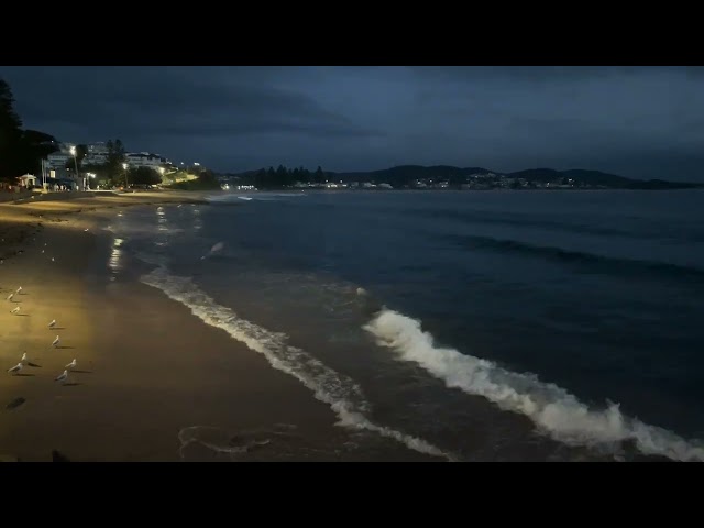 Incoming tide at Terrigal Beach. A half hour before sunrise.