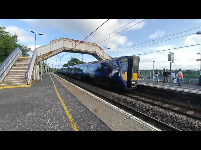 Scotrail EMU arrives at Carluke on 2021- 08-14 at 1903 in VR180