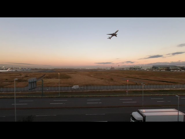 Airplane taking off from Haneda Airport in Tokyo, Japan