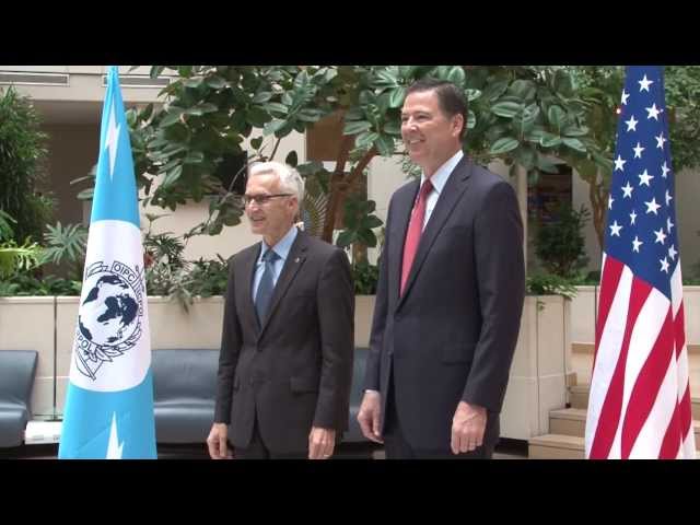 FBI Director James Comey visits INTERPOL