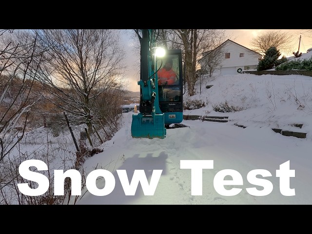 Testing the new mini excavator on snow