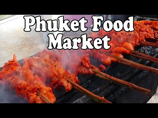 Eating Street Food in Phuket at a Local Market. Thai Street Food in Thailand