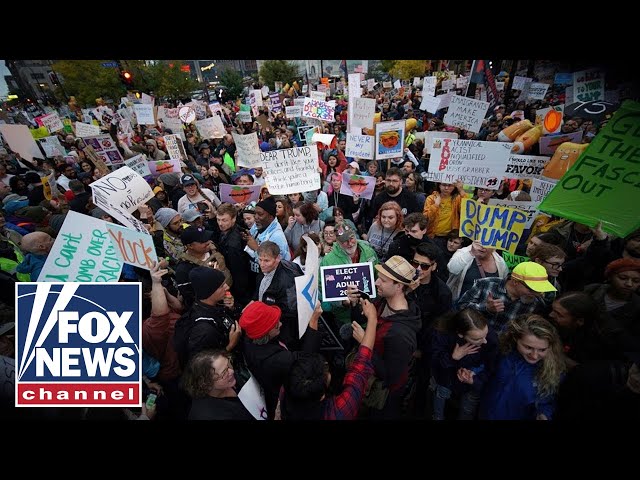 Protesters light MAGA hats on fire outside of 'Keep America Great' rally in Minnesota