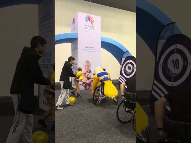 Handballing the footy at the Disability Connection Expo 2023