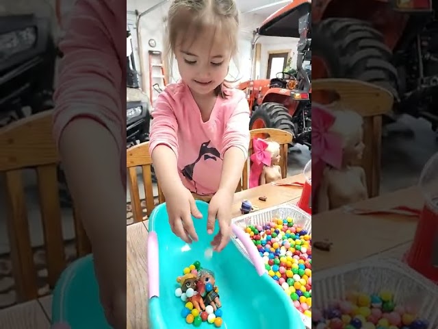 Cute 3-Year-Old Baby Girl Playing Gumball Candy Filled Bathtub with Baby Doll #baby #candy #asmr