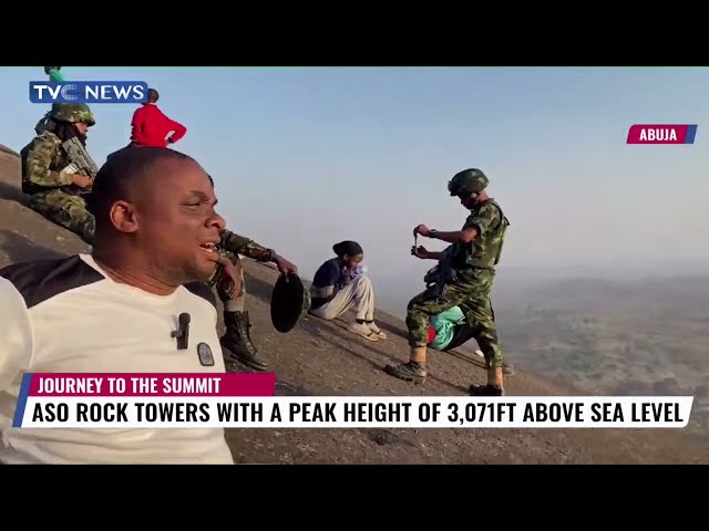 Watch As Nigerian Troops, Civilians Climb Up To 3,071 Feet Of Aso Rock