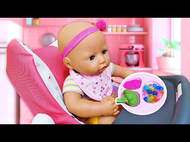 Baby Annabell doll goes shopping and chooses a new plate and a pacifier for the baby.