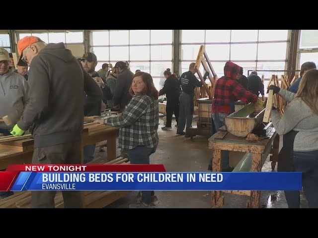 Volunteers build dozens of beds for Evansville children