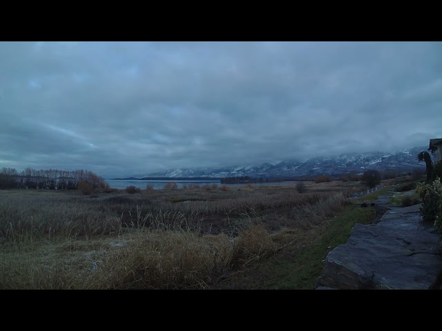 New Year's Eve Sunset across Flathead Lake after snowfall in Mission Mountains, Polson, MT.