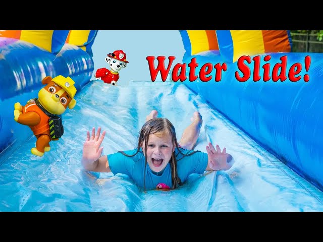 Assistant and Paw Patrol have Inflatable Bounce House Slip n Slide fun