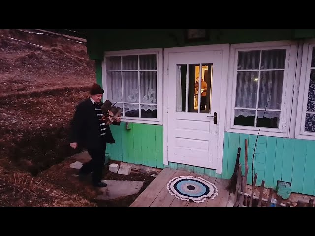 Happy old age of an elderly couple, far from civilization, in a mountain village.