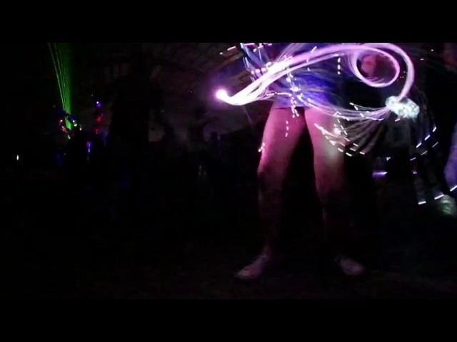 Cute Raver Girl with LED Laser Whip Dancing