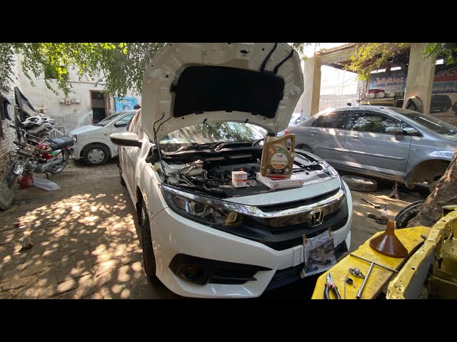 Honda civic 18 model ￼ foundation repair ￼fan belt oil filter air filter and engine oil change