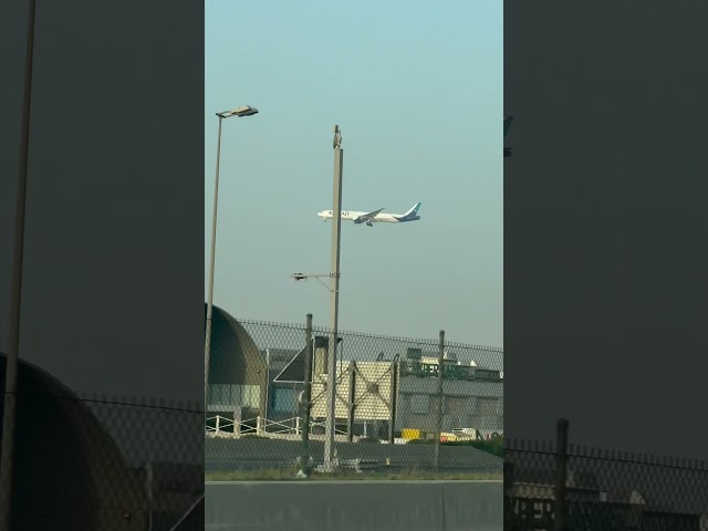 Kuwait international airways airbus A320 flying towards Kuwait international airport terminal 4