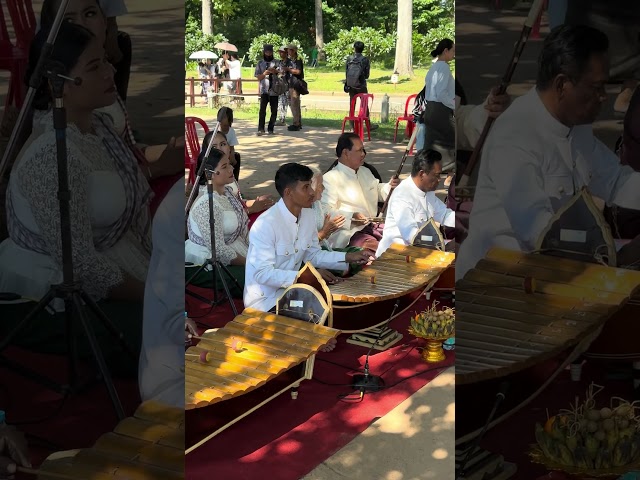 Traditional Khmer music in front of Angkor Wat .