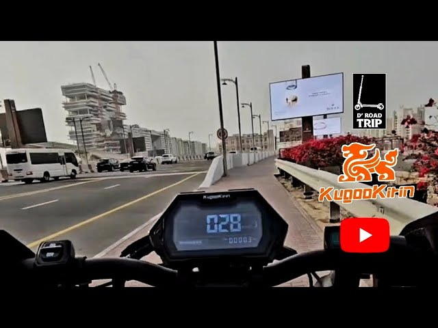 Navigating to Palm Jumeirah: A Memorable Scooter Ride 🛴💨🇦🇪